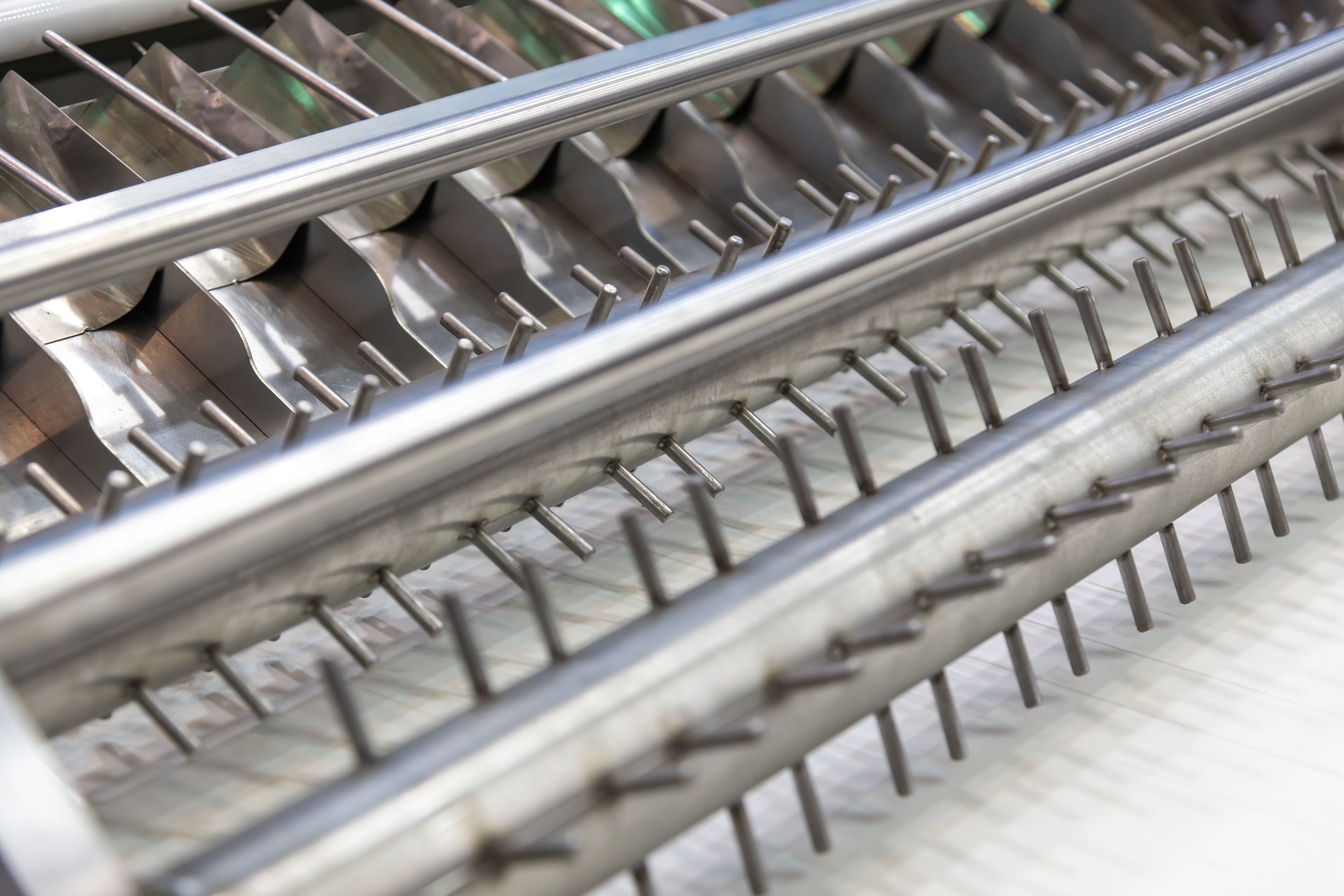 Close-up view of industrial metal machinery parts in a manufacturing setting