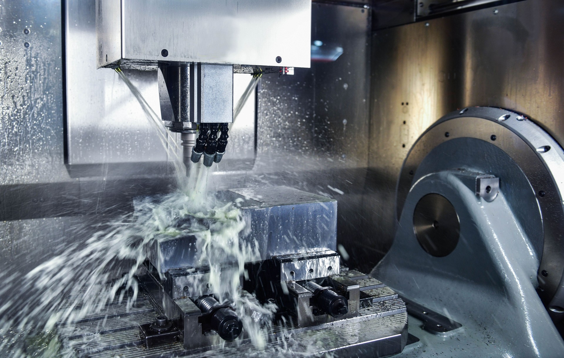 Metalworking CNC milling machine. Cutting metal modern processing Hi-technology machining concept.